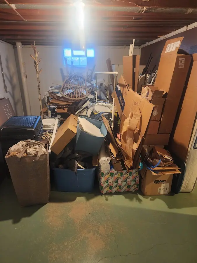 Roll-off dumpster container at job site for 2 Yard Dumpster Rental in Hannahs Mill